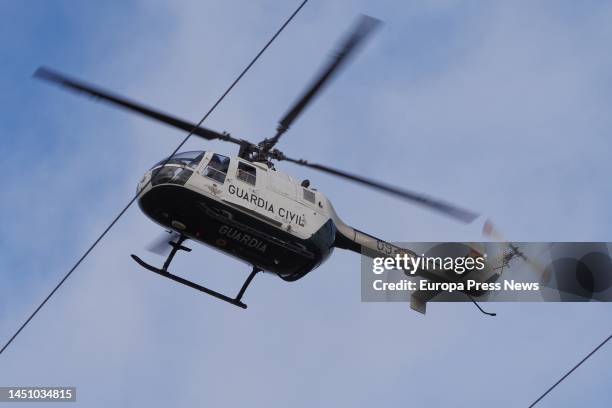 Helicopter flies over Villamarciel, Valladolid, Castilla y Leon , on December 21 in search of the missing pilot in the Duero river. The Special Group...