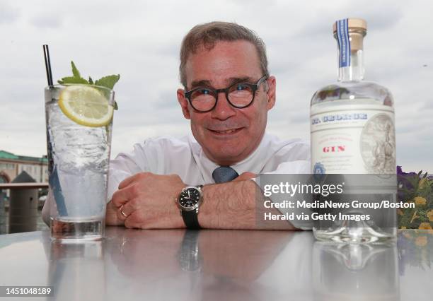 Roger Berkowitz shows off the ultimate Gin and Tonic made with St. George's Gin served with a lemon garnish and a mint sprig at Legal Seafoods...