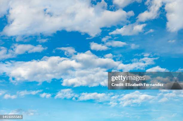 clouds on blue sky - wolkengebilde stock-fotos und bilder