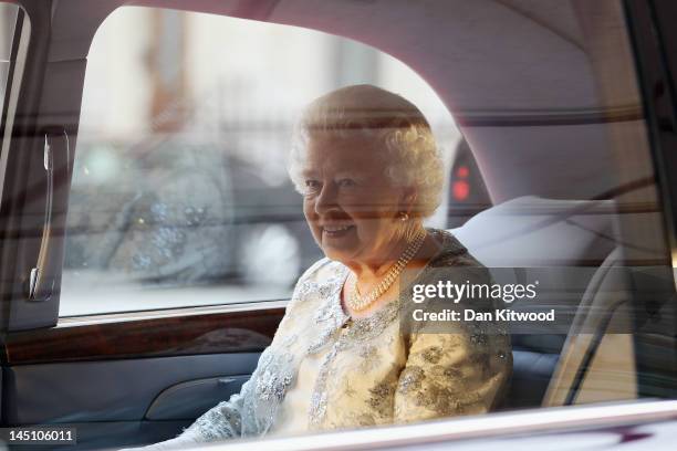 Queen Elizabeth II leaves after attending a special 'Celebration of the Arts' event at the Royal Academy of Arts on May 23, 2012 in London, England.