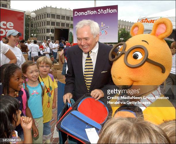 Marc Brown, creator of the popular children's book 'Arthur' was at City Hall Plaza helping volunteers pass out thousands of backpacks and school...