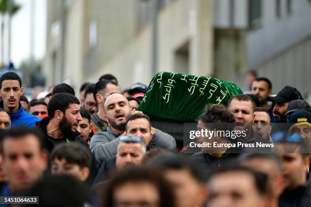 Several relatives carry the coffin with the remains of the eight-year-old boy to the Sidi Embarek Muslim cemetery, on 21 December, 2022 in Ceuta,...