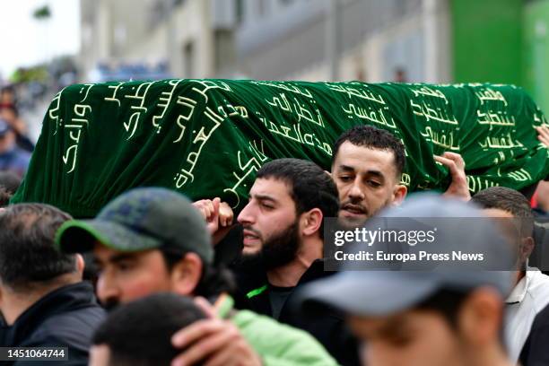 Several relatives carry the coffin with the remains of the eight-year-old boy to the Sidi Embarek Muslim cemetery, on 21 December, 2022 in Ceuta,...