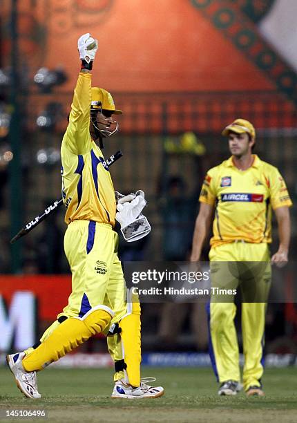 Chennai Super Kings captain Mahendra Singh Dhoni celebrating after his teams’ victory in the first eliminator match of IPL 5 played btween Mumbai...