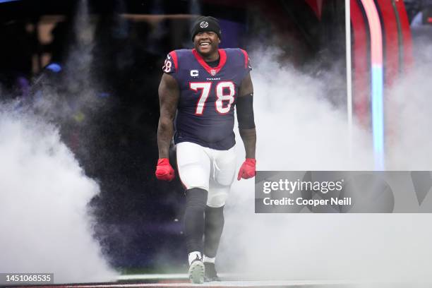 Laremy Tunsil of the Houston Texans runs onto the field during introductions against the Kansas City Chiefs at NRG Stadium on December 18, 2022 in...