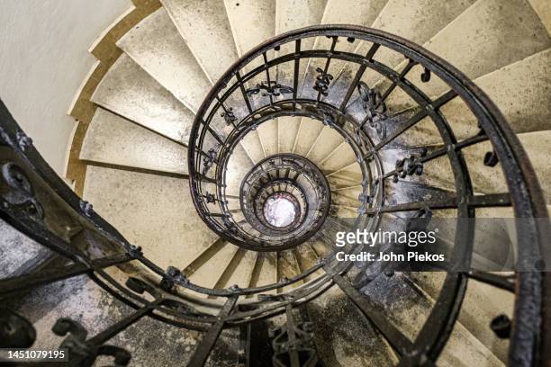 looking down while climbing the circular stairs down from
 the tower dome in st. stephen's basilica - basilica of st stephen budapest stock pictures, royalty-free photos & images