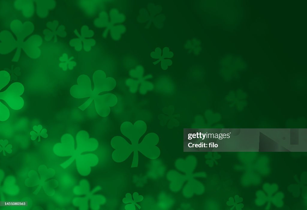 Four-Leafed Clover Shamrock St. Patrick's Day Textured Green Background