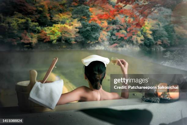 onsen relax - in a japanese garden stock-fotos und bilder