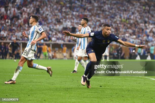 Kylian Mbappe of France celebrates scoring his side's second goal during the FIFA World Cup Qatar 2022 Final match between Argentina and France at...