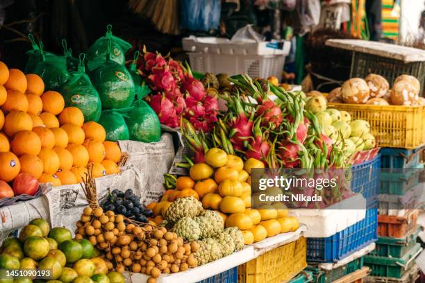 exotic fruits, asian market - vietnam market stock pictures, royalty-free photos & images