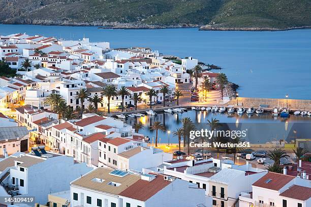 spain, fornells, menorca, view of harbour at evening - minorca stock-fotos und bilder