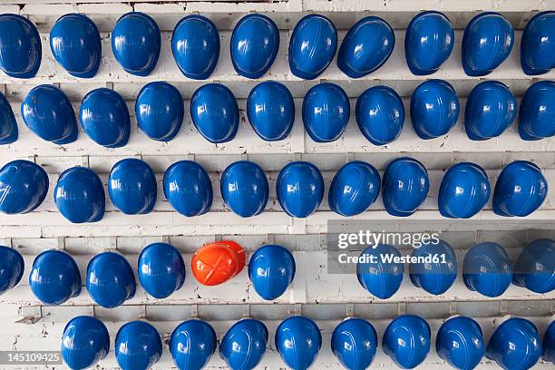 germany, row of helmets - schutzhelm stock-fotos und bilder