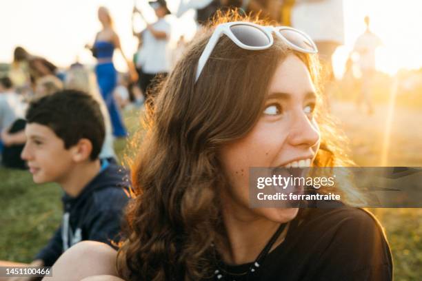 teenagers goofing around at music festival - expressive and music stock pictures, royalty-free photos & images