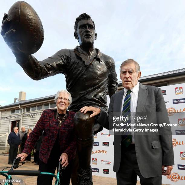 In this June 19, 2017 file photo, former All Black great, Sir Colin Meads, right, and his wife Vera pose for a photo with the statue of himself at...