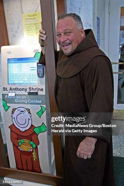 Fr. David Convertino shows off the "Franciscan giving center" at St. Anthony's shrine. Wednesday, August 22, 2007. Staff photo by John Wilcox