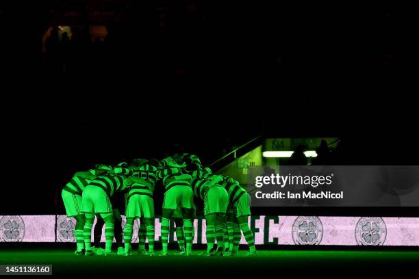 Players of Celtic huddle prior to the Cinch Scottish Premiership match between Celtic FC and Livingston FC at on December 21, 2022 in Glasgow,...