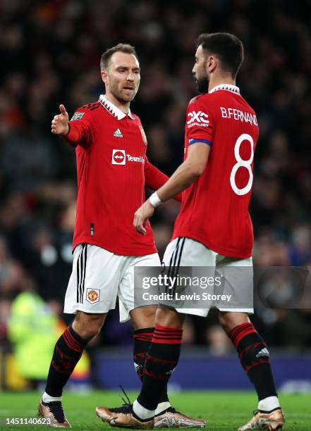 Christian Eriksen of Manchester United celebrates scoring their side's first goal with teammate Bruno Fernandes during the Carabao Cup Fourth Round...