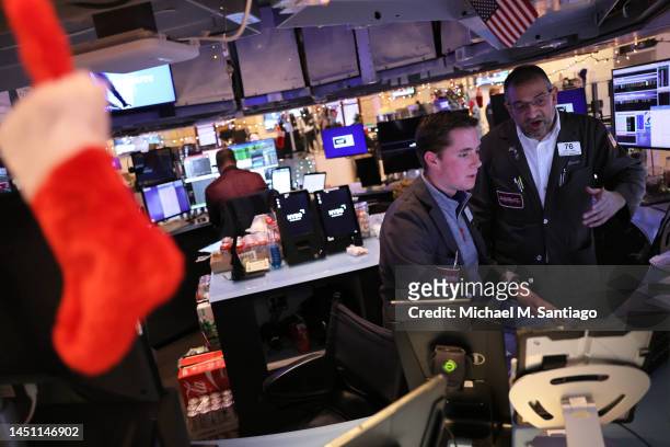 Traders work on the floor of the New York Stock Exchange during afternoon trading on December 21, 2022 in New York City. Stocks closed strong today...