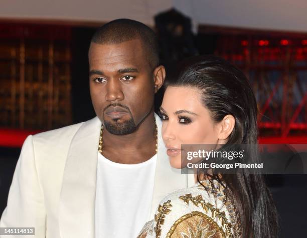 Kanye West and Kim Kardashian attend the "Cruel Summer" Premiere during the 65th Annual Cannes Film Festival at Palm Beach on May 23, 2012 in Cannes,...