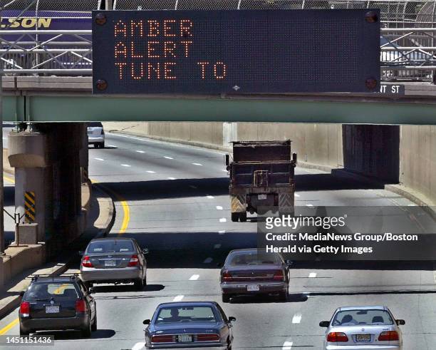 Sign over the Mass Pike gives out the amber alert.