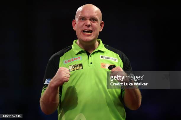 Michael van Gerwen of Netherlands celebrates the win during his Second Round Match against Lewy Williams of England during Day Seven of The Cazoo...
