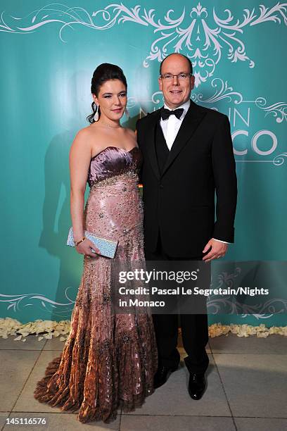 Melanie Antoinette de Massy and Prince Albert II of Monaco attend the "Nights In Monaco" Gala Fundraiser Cocktail Reception equally benefiting The...