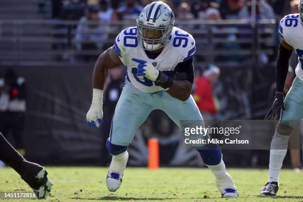 DeMarcus Lawrence of the Dallas Cowboys rushes against the Jacksonville Jaguars during the game at TIAA BANK Stadium on December 18, 2022 in...