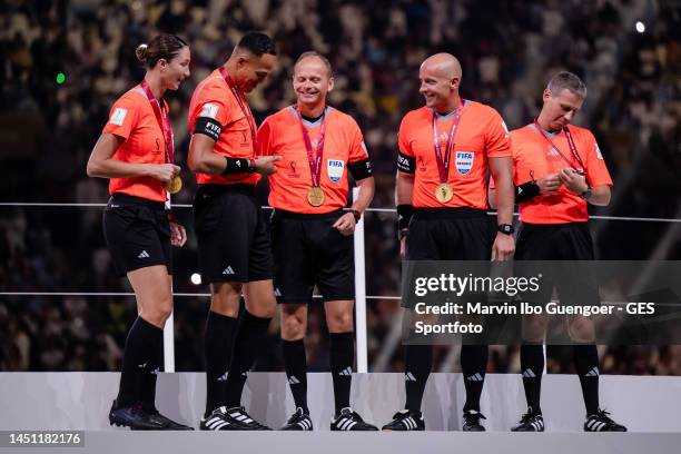 Reserve Assistant Referee Kathryn Nesbitt, Fourth Official Ismail Elfath, Assistant Referee Pawel Sokolnicki, Referee Szymon Marciniak and Assistant...