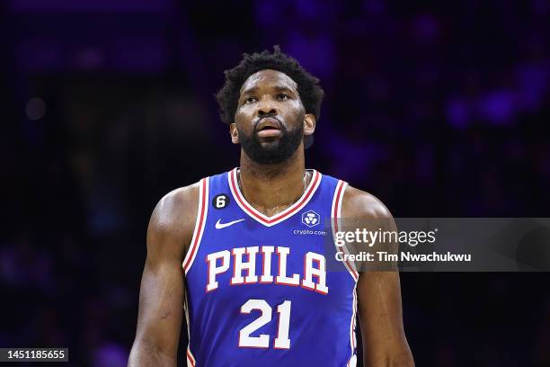 Joel Embiid of the Philadelphia 76ers looks on during the first quarter against the Detroit Pistons at Wells Fargo Center on December 21, 2022 in...