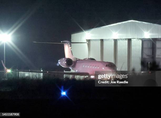 Plane taxis toward the runway at Odyssey Aviation with FTX co-founder Sam Bankman-Fried on board as he is extradited to the United States on December...