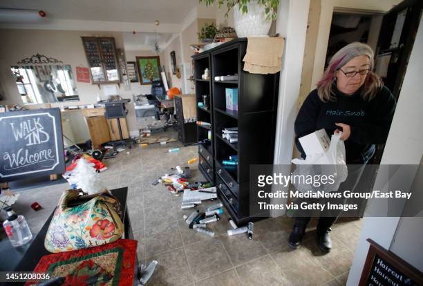 Bobbi Jo Lewis savages items from where she works as a hair stylist at JH & Company in Fortuna, Calif., on Wednesday, Dec. 21, 2022. A 6.4 magnitude...