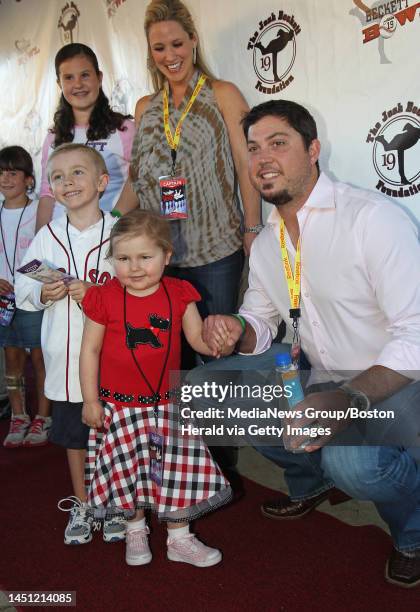 Boston, MA ? Avalanna Routh Roberts of Merrimac, a Jimmy Fund child battling Cancer, poses with Red Sox pitcher Josh Beckett on the red carpet at the...