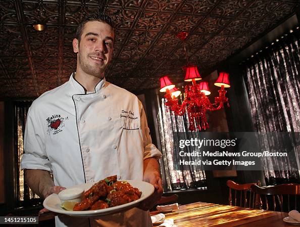 Chef Jimmy Sous chef Jimmy Christensen shows off Valentina hot wings at Lolita ...