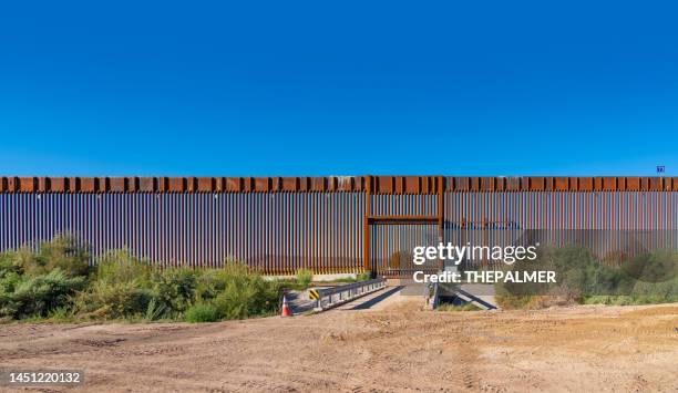 the wall - usa-mexico - border fence stock pictures, royalty-free photos & images