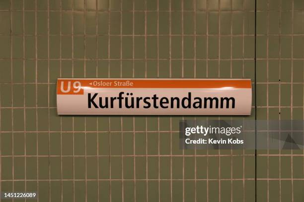 subway sign of the station "kurfürstendamm" in berlin, germany. - kurfurstendamm foto e immagini stock