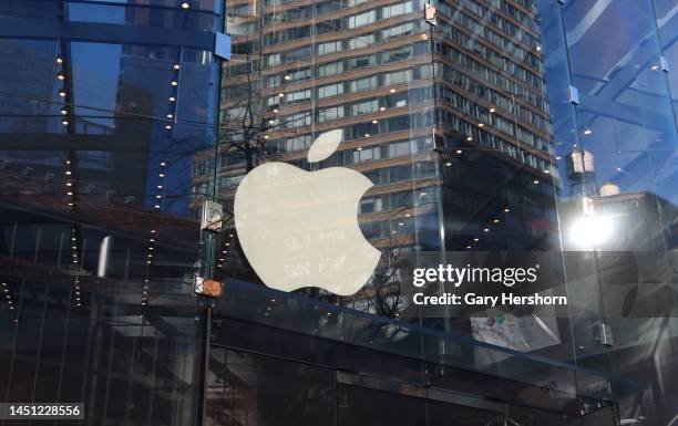 An Apple logo is displayed in the window of their Upper West Side store on December 21 in New York City.