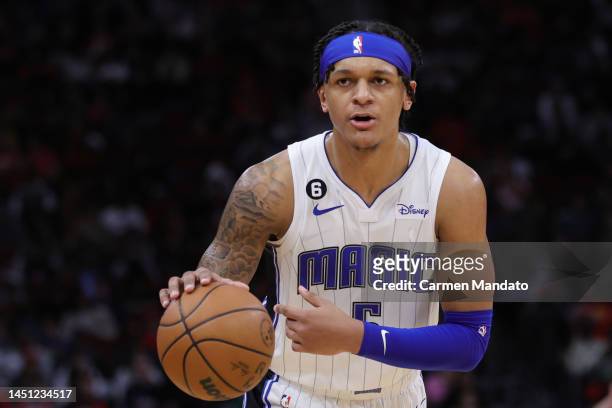 Paolo Banchero of the Orlando Magic controls the ball during the second half against the Houston Rockets at Toyota Center on December 21, 2022 in...