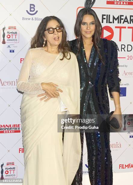 Neena Gupta and Neha Dhupia attend the 'Filmfare OTT Awards' on December 21, 2022 in Mumbai, India.