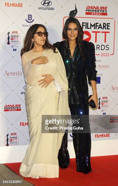 Neena Gupta and Neha Dhupia attend the 'Filmfare OTT Awards' on December 21, 2022 in Mumbai, India.