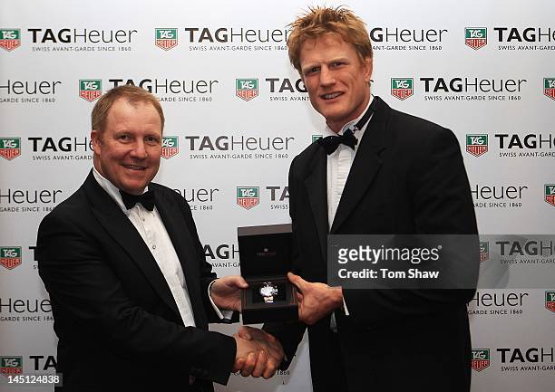 Rob Diver of TAG Heuer UK and Hugh Vyvyan of Saracens pose with the TAG Heuer Special Merit Award during the RPA Computacenter Rugby Players Awards...