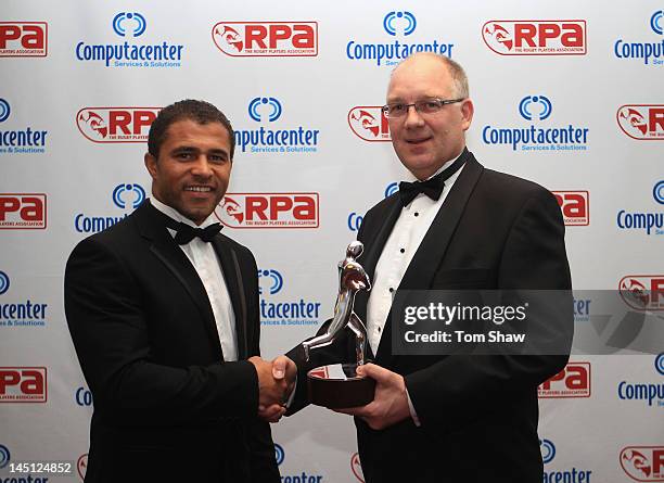 Jason Robinson poses with Roger Gadd of KPMG with the RPA Hall of Fame Induction in association with KPMG trophy during the RPA Computacenter Rugby...