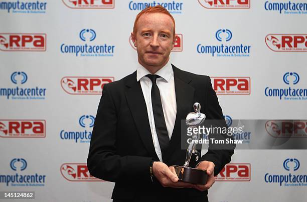 Ben Ryan of England 7s poses with the HSBC England 7s Player of the Year Award he accepted on behalf of Mat Turner during the RPA Computacenter Rugby...