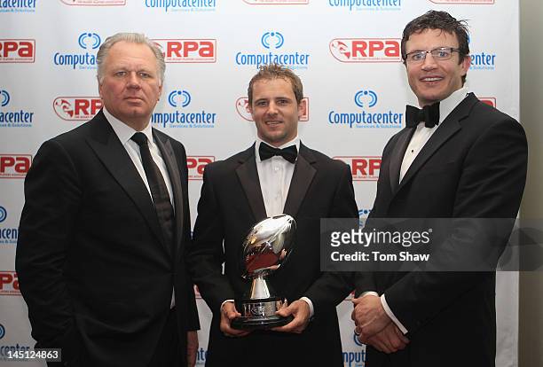 Mike Norris of Computacentre and Nick Evans of Harlequins and Martin Corry pose with the Computacentre Players Player of the Year Award during the...