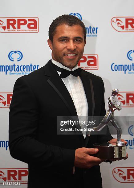 Jason Robinson poses with the RPA Hall of Fame Induction in association with KPMG trophy during the RPA Computacenter Rugby Players Awards 2012 at...