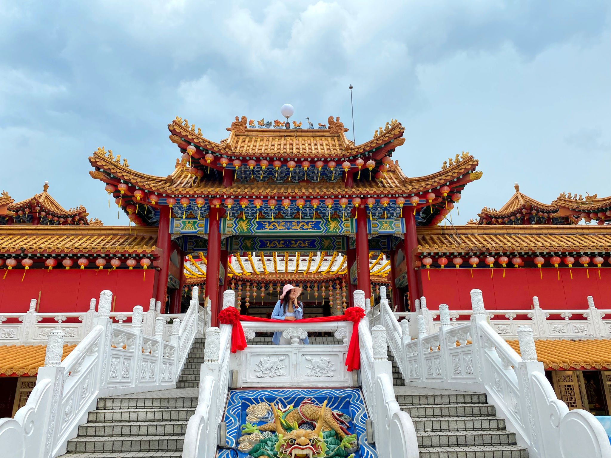 Young asian woman and Chinese temple in Kuala Lumpur Young asian woman and Chinese temple in Kuala Lumpur