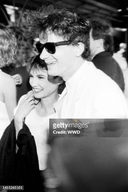 Nancye Ferguson and Mark Mothersbaugh attend an event at Mann's Chinese Theatre in Hollywood, California, on July 26, 1984.