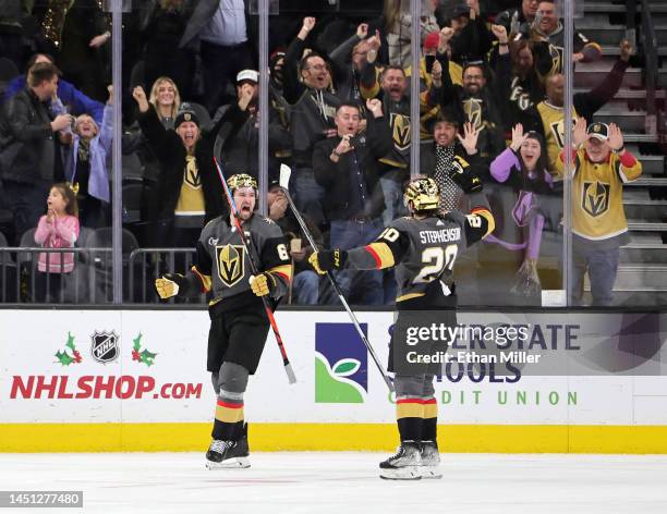 Mark Stone and Chandler Stephenson of the Vegas Golden Knights celebrate after Stephenson assisted Stone on a short-handed goal against the Arizona...