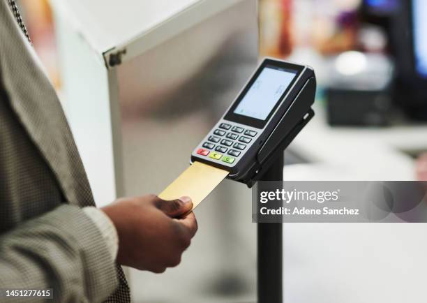 credit card, payment and customer hands at pos register terminal for product purchase, retail service or supermarket commerce. finance bank card, shopping point of sale machine and black man checkout - convenience store counter stockfoto's en -beelden