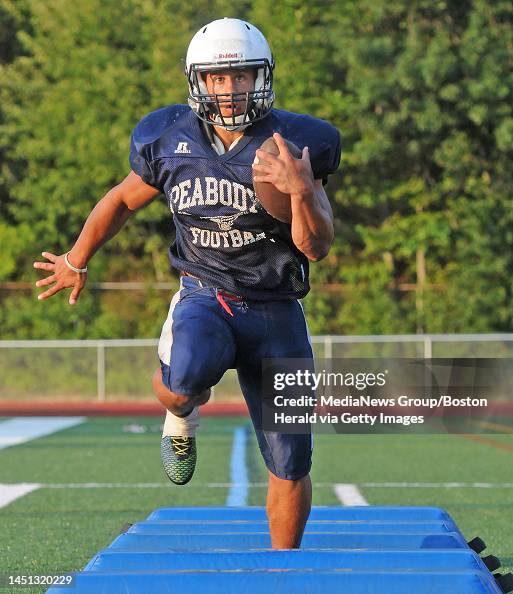 Peabody High School football standout Doug Santos runs an agility