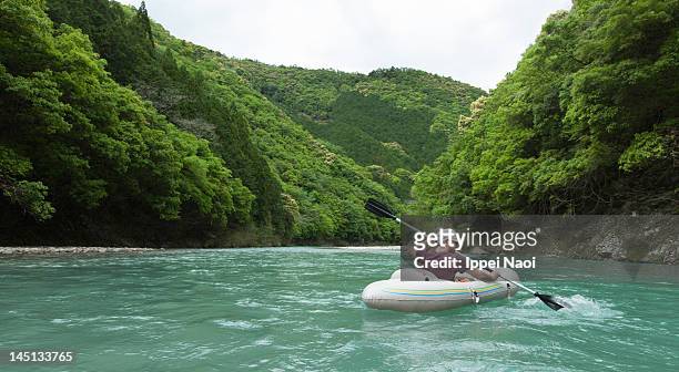 man kayaking on forest river - wakayama prefecture stock pictures, royalty-free photos & images